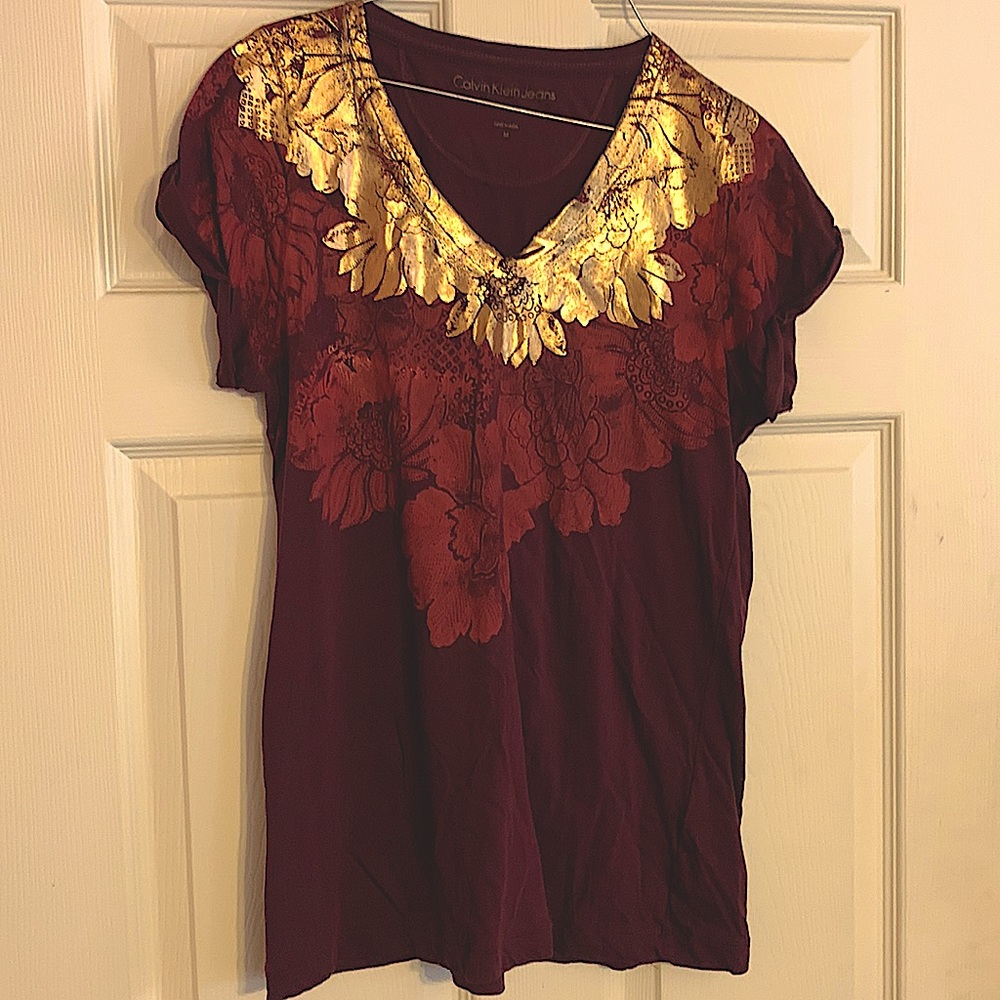 Calvin Klein tshirt. Size Medium. Good condition.